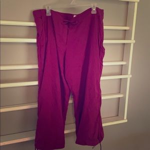 Purple capri length pants.